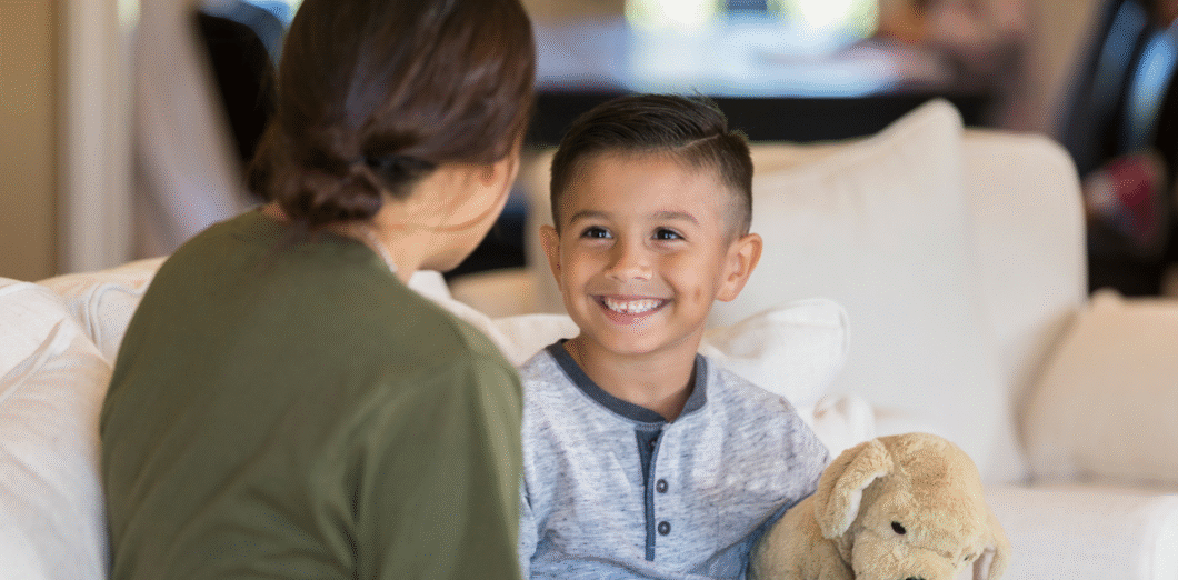 Boy talking with mom