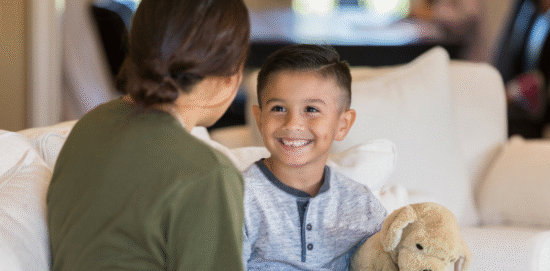 Boy talking with mom