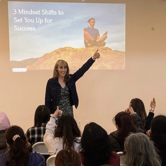 Rachel speaking in front of a group